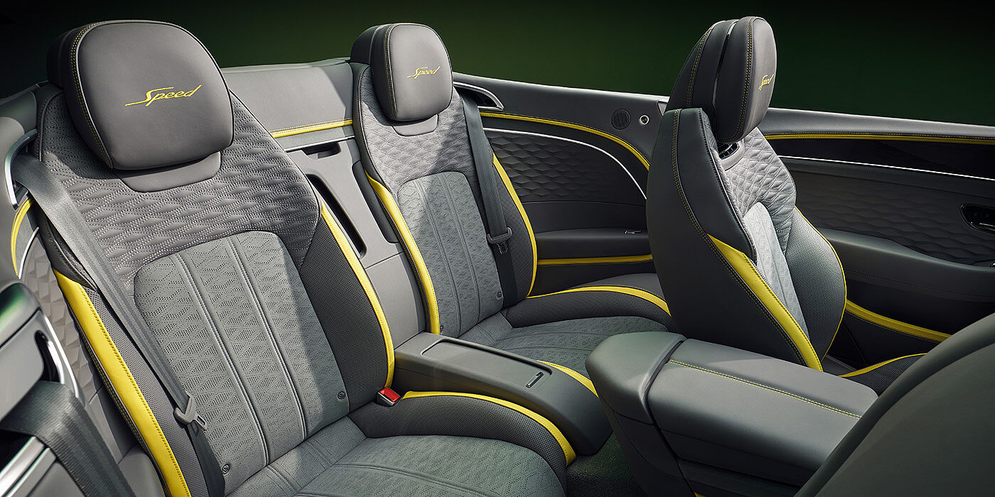 Bentley Melbourne Bentley New Continental GTC Speed convertible rear interior with unique Speed colour split in Gravity Grey and Cyber Yellow hide colours, and contrast stitched headrest emblems 