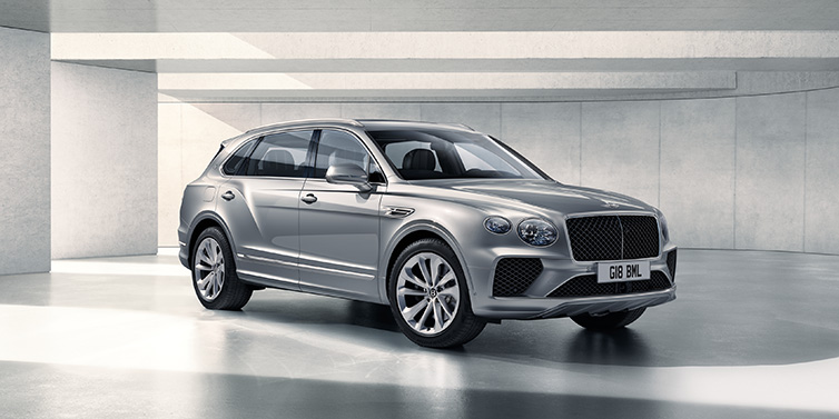 Bentley Melbourne Bentley Bentayga Extended Wheelbase SUV front three quarter in Moonbeam paint with a grey background